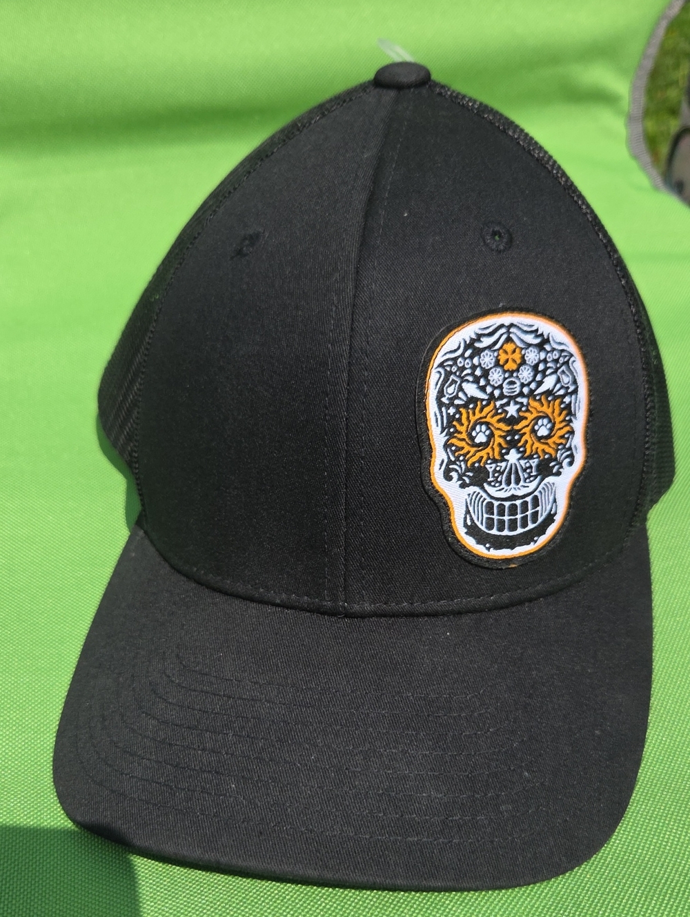 The Classic Black Truckers Cap with Orange & White Sugar Skull Patch